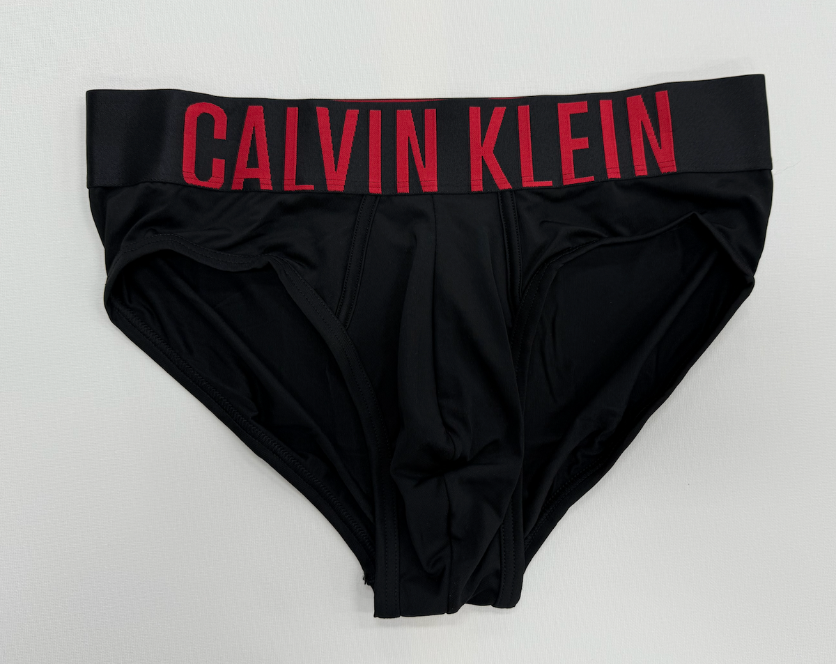 Black Calvin Klein underwear on a light gray background